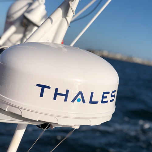 Thales Vesselink satellite dish on a boat with water in the background